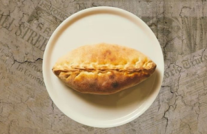 25C. Indbagt Pizza